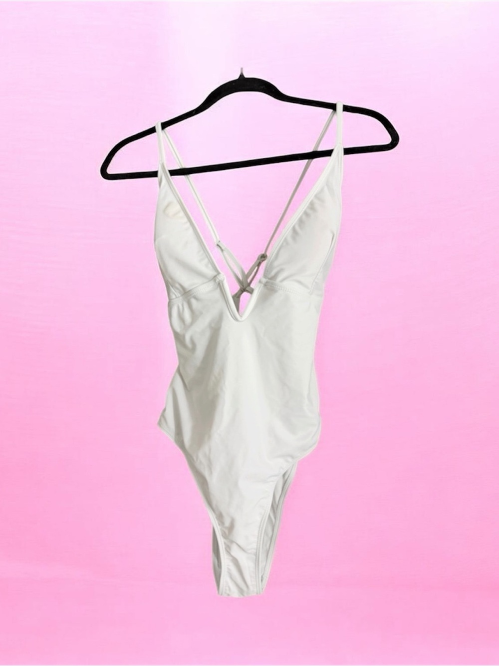 Sleek White Strappy One-Piece Swimsuit